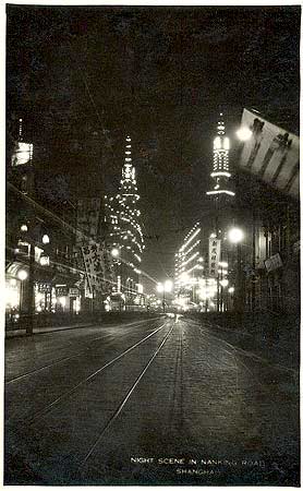 vintage postcard Shanghai Nanking road by night c1920