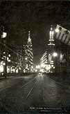 vintage postcard Shanghai Nanking road by night c1920