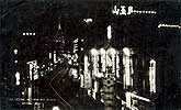 Shanghai night scene in Nanking road c1920